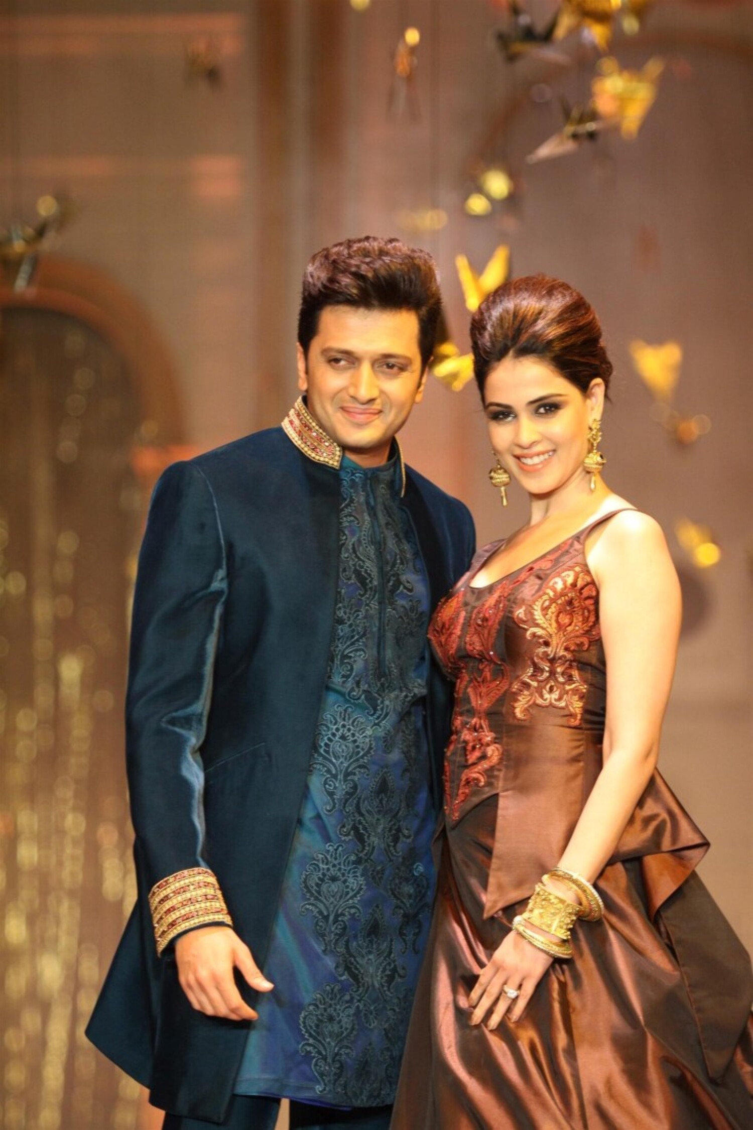 Ritesh Deshmukh with wife Genelia walking the ramp for Neeta Lulla at