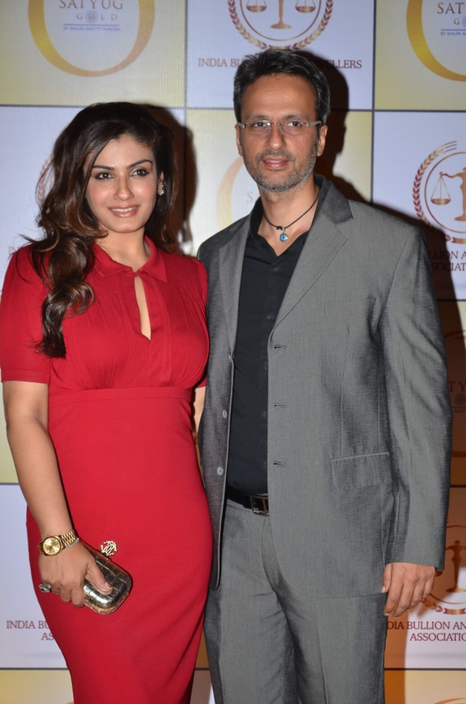 Raveena Tandon with husband Anil Thadani at the launch of Satyug Gold